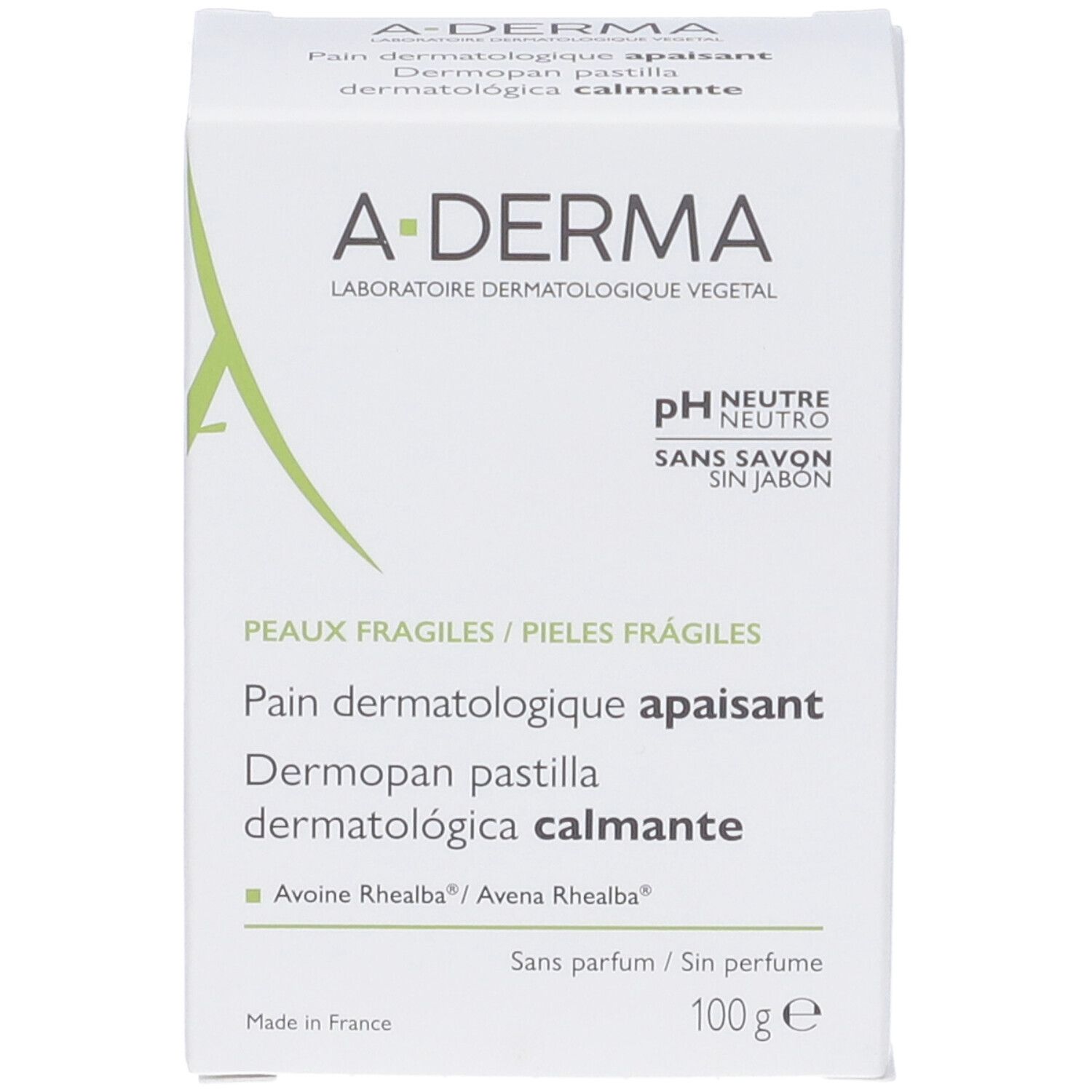 Scatola bianca. Logo A-DERMA. Testo: Pain dermatologique apaisant. pH Neutro. Senza sapone. 100g.