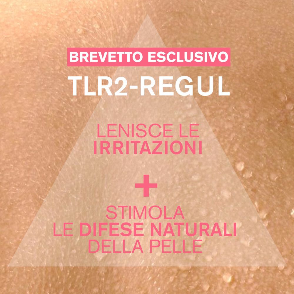 Pelle con testo. Brevetto esclusivo TLR2-REGUL. Lenisce le irritazioni. Stimola le difese naturali.