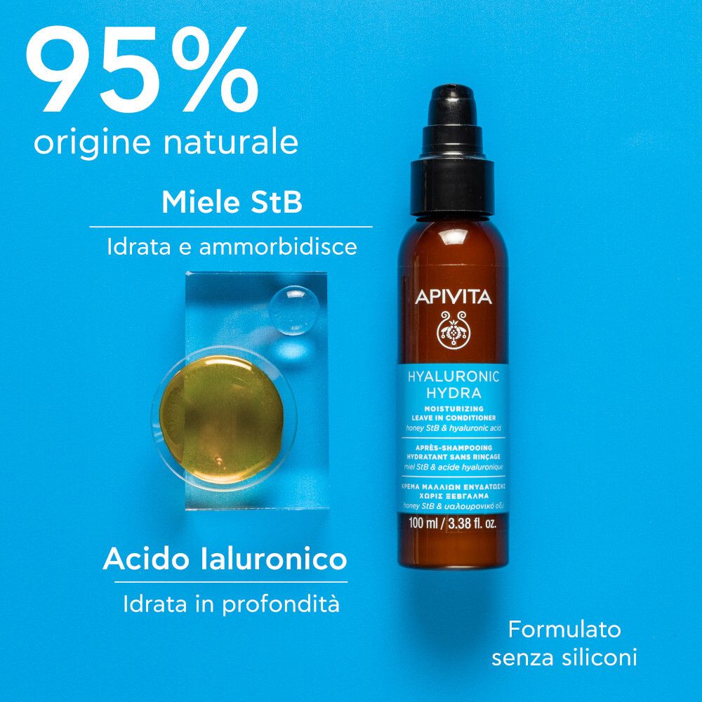 Flacone marrone con erogatore nero. Scritta: Apivita Hyaluronic Hydra. Testo su sfondo blu. Liquido giallo.