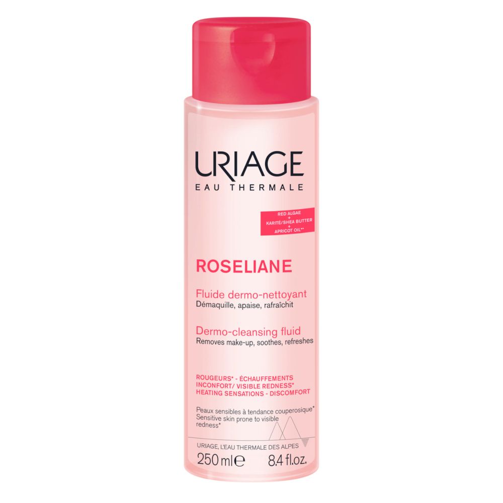 Uriage Roséliane Fluido dermo-detergente. Flacone con tappo rosso. Contiene 250 ml. Testo: Dermo-detergente, rimuove il trucco, lenisce, rinfresca.