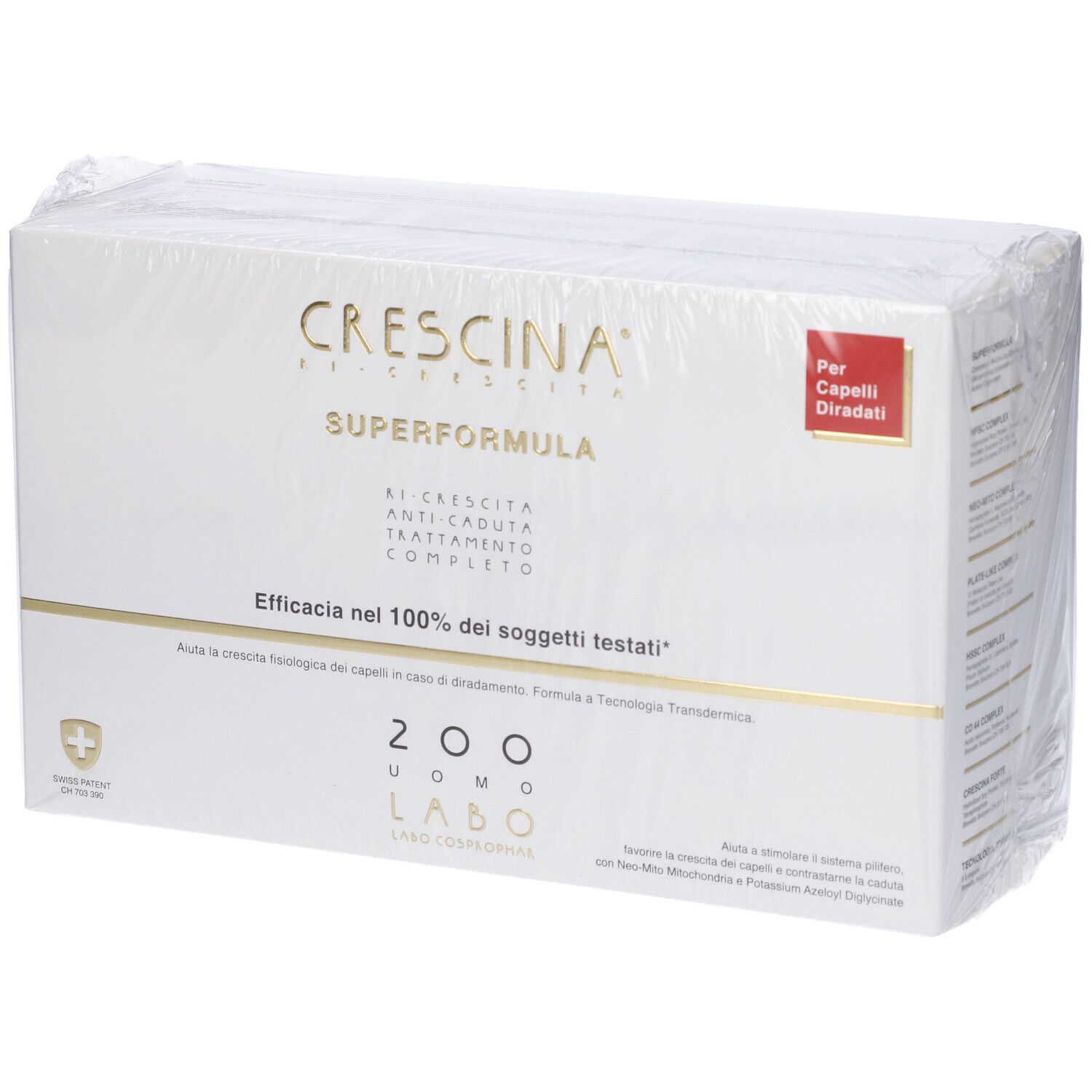 Scatola bianca sotto cellophane. Scritta dorata. Etichetta rossa con testo.