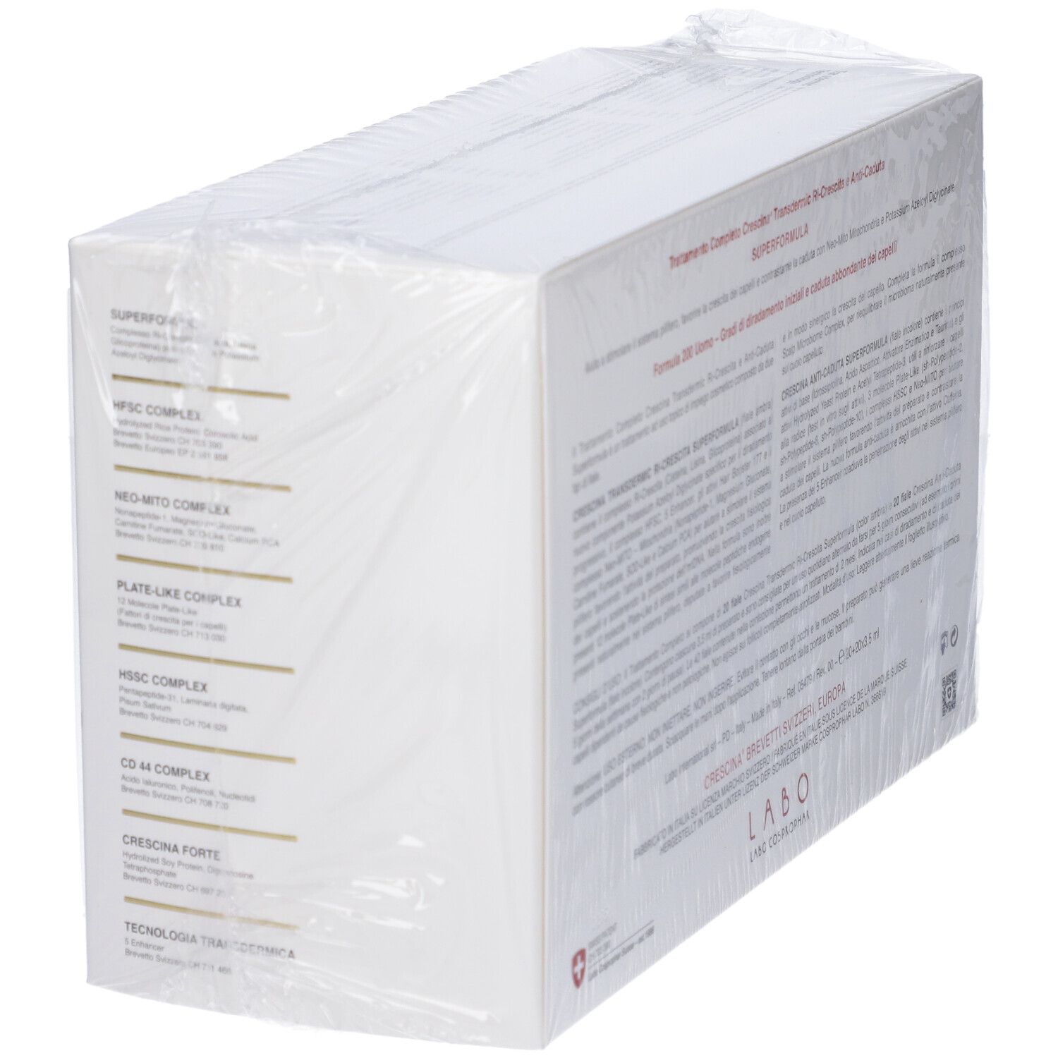 Scatola bianca in cellophane. Testo multilingue. Croce svizzera.
