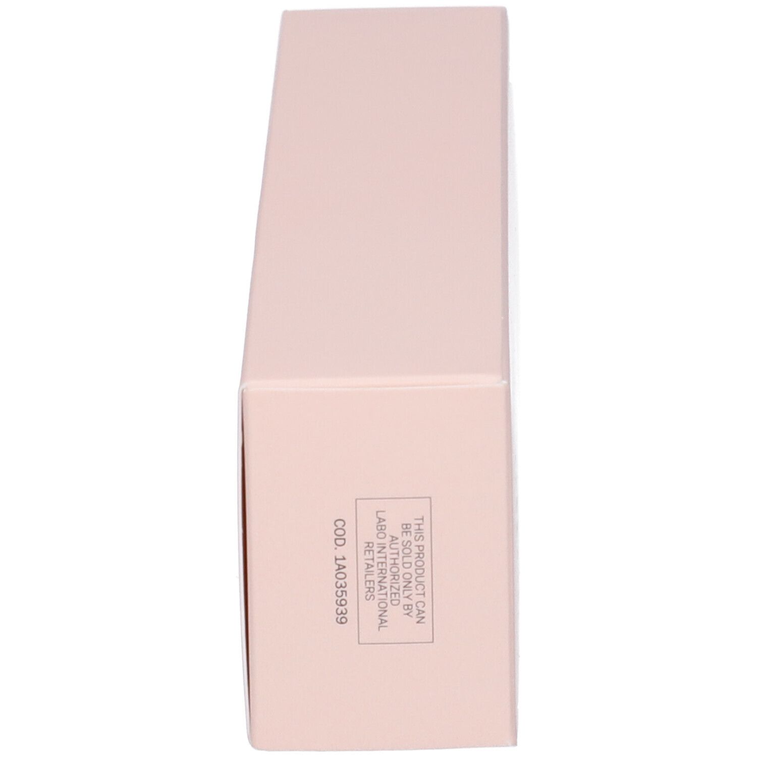 Scatola rosa, vista laterale. Testo in italiano.