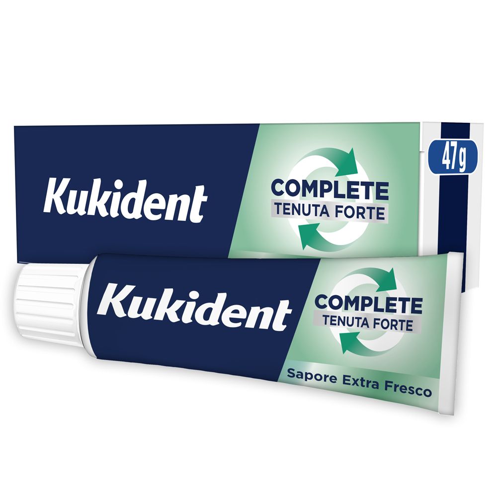 Kukident Complete Extra Fresco. Tube und Schachtel. Weißer Tubenkopf. 47g. Aufschrift: COMPLETE, Tenuta Forte, Sapore Extra Fresco.