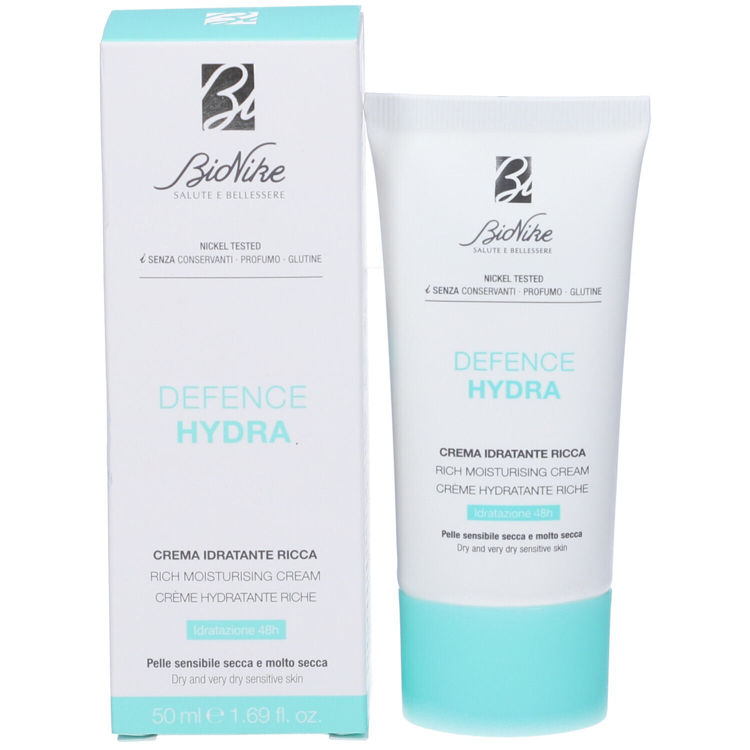 Produktverpackung und Tube. Weiße Verpackung mit türkisfarbenen Akzenten. Aufschrift: Defence Hydra, Creme Idratante Ricca. Marke: Bionike.