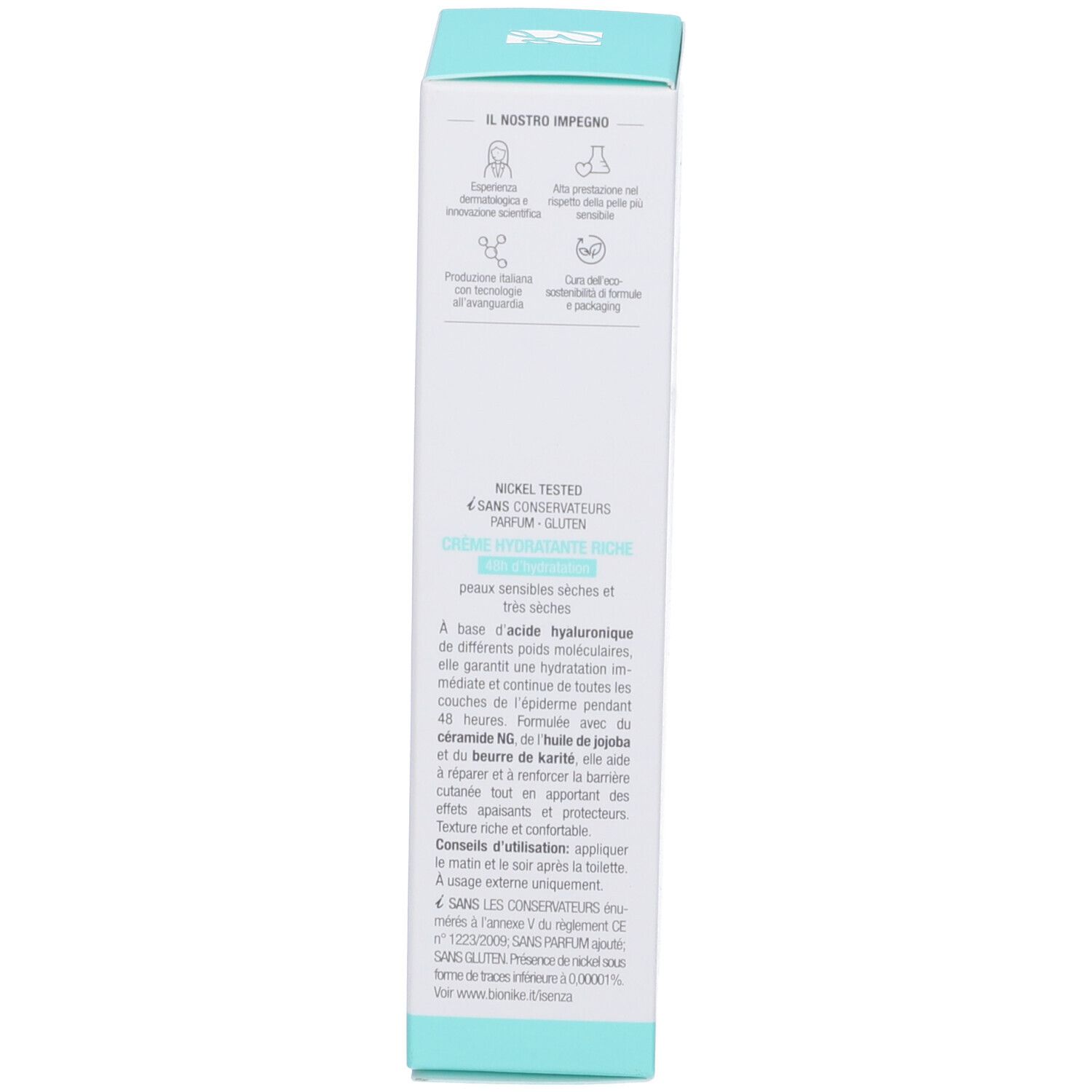 Seitenansicht der Produktverpackung. Weiß mit türkisfarbenen Akzenten. Text in mehreren Sprachen. Aufschrift: Creme Idratante Ricca. Nickel Tested.
