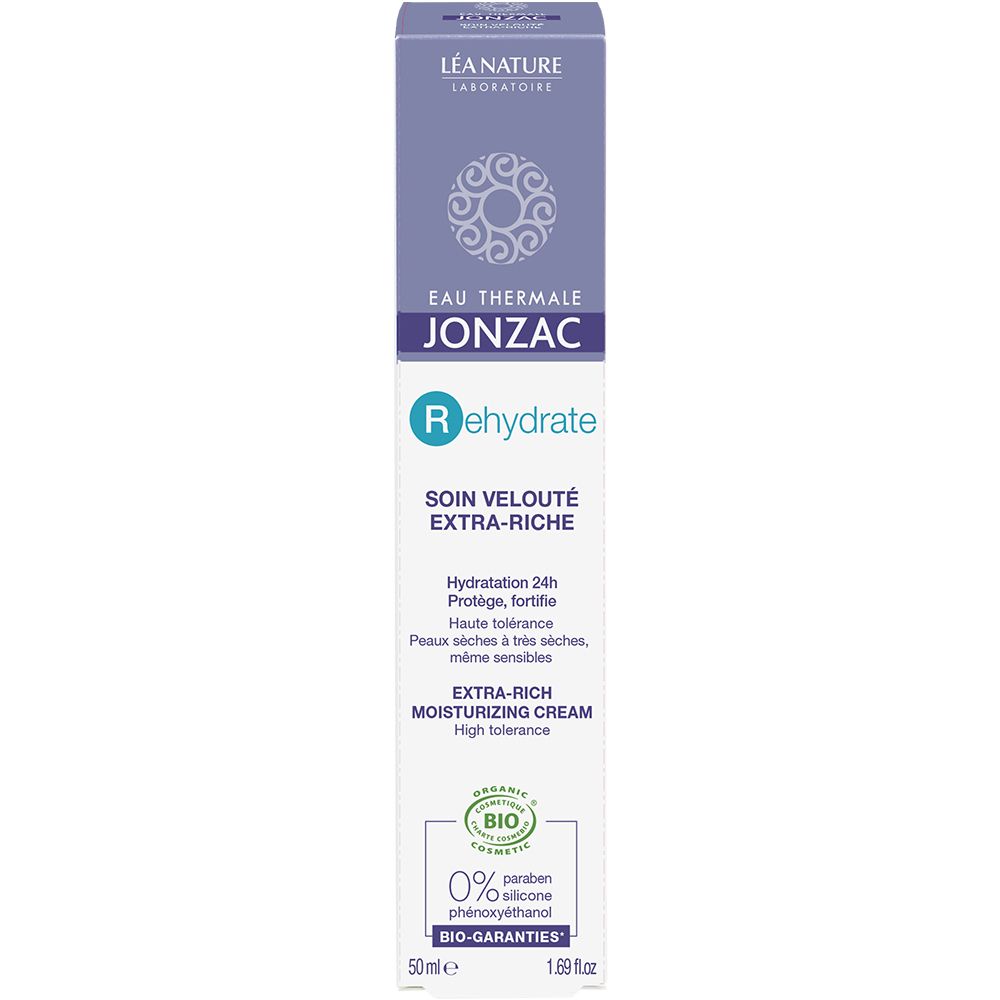 Creme-Verpackung. Weiß, mit lila Akzenten. Text: Eau Thermale Jonzac, Rehydrate, Extra-Ricca Idratante. Bio-Zertifizierung.