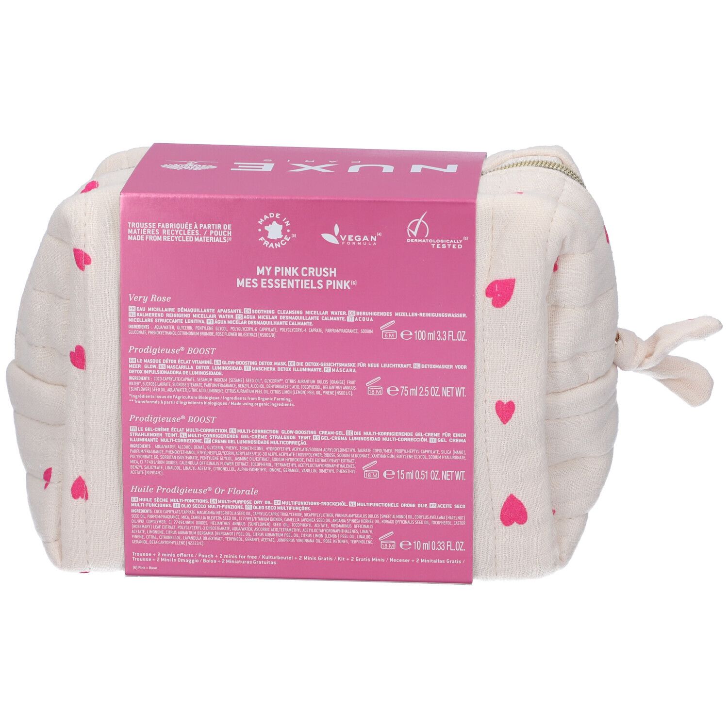 Retro della confezione con testo e nomi dei prodotti. Su sfondo crema con cuori rosa.