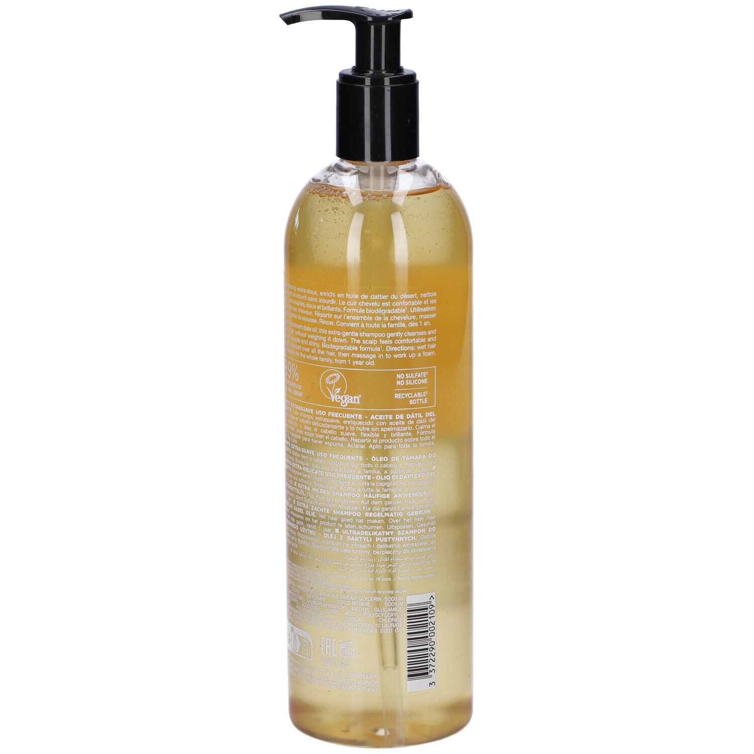Rückseite der Shampoo-Flasche. Text in mehreren Sprachen. Mit Pumpe.