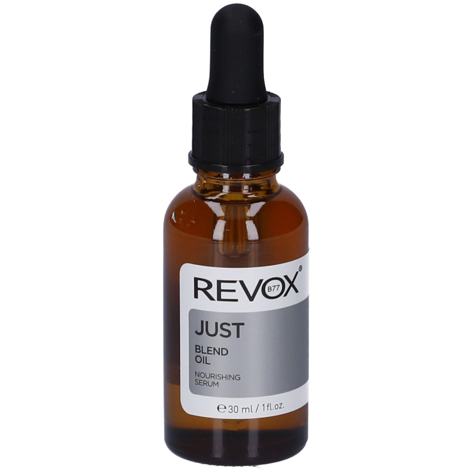 Revox Just Blend Oil, un siero nutriente in flacone di vetro marrone con contagocce.