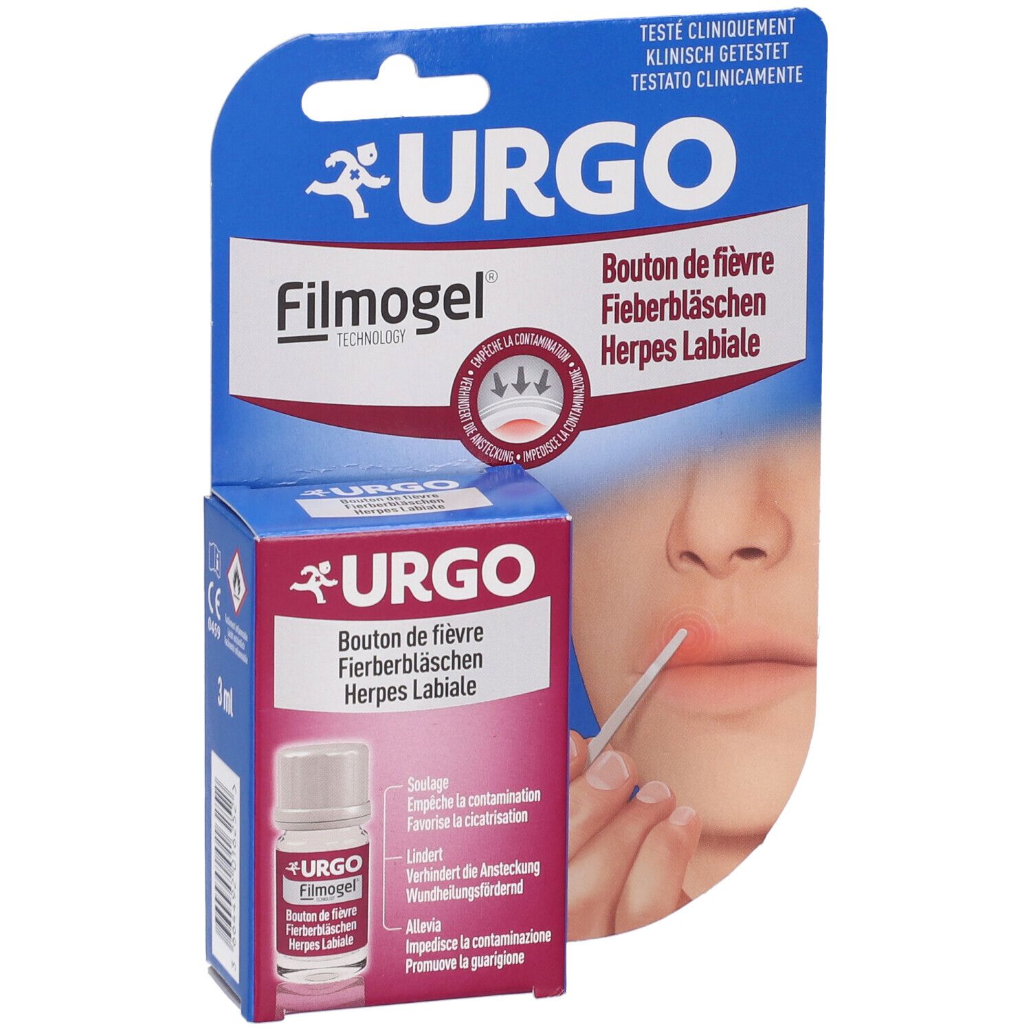 Verpackung mit Produkt und Produktfläschchen. Aufschrift: URGO Filmogel. Abbildung eines Mundes mit Lippenherpes.