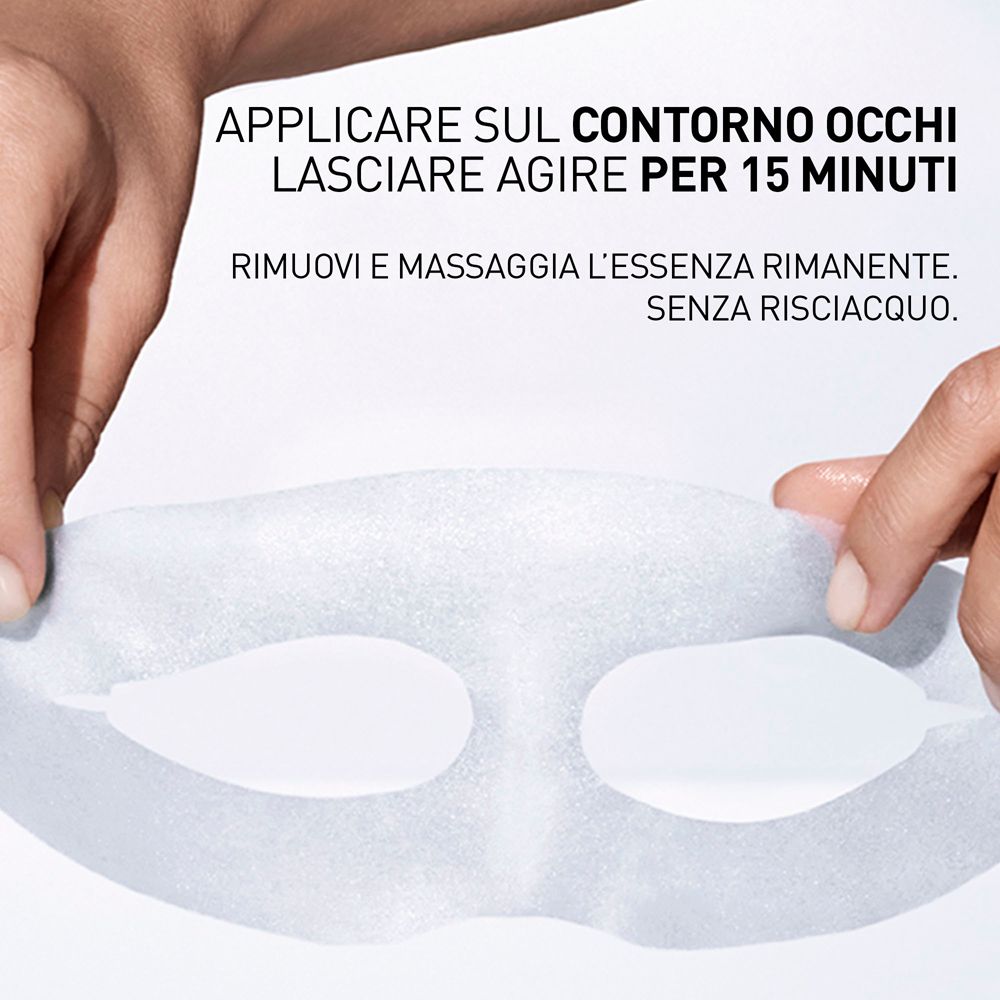 Mani che tengono una maschera occhi. Testo: APPLICARE SUL CONTORNO OCCHI, LASCIARE AGIRE PER 15 MINUTI.