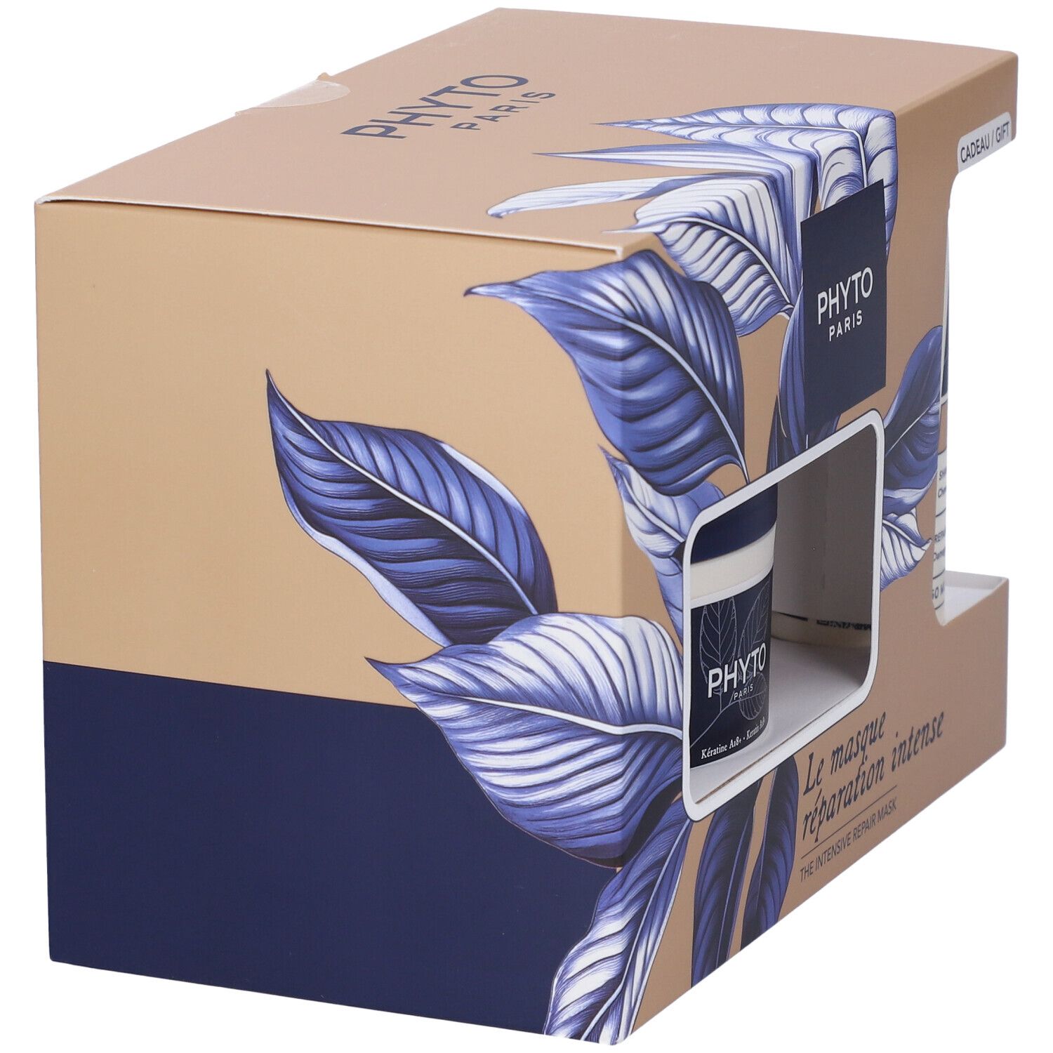 Geschenkbox mit Shampoo und Haarmaske. Karton mit blauem Blattmuster und Markenlogo. Enthält zwei Produkte.