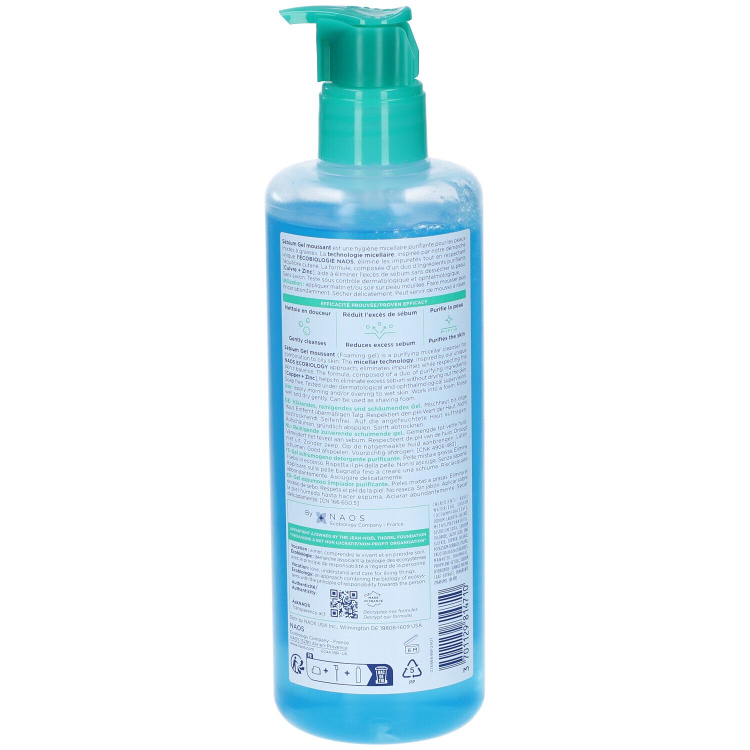 Blaue Flüssigkeit in einer durchsichtigen Pumpflasche mit türkisfarbenem Spender.