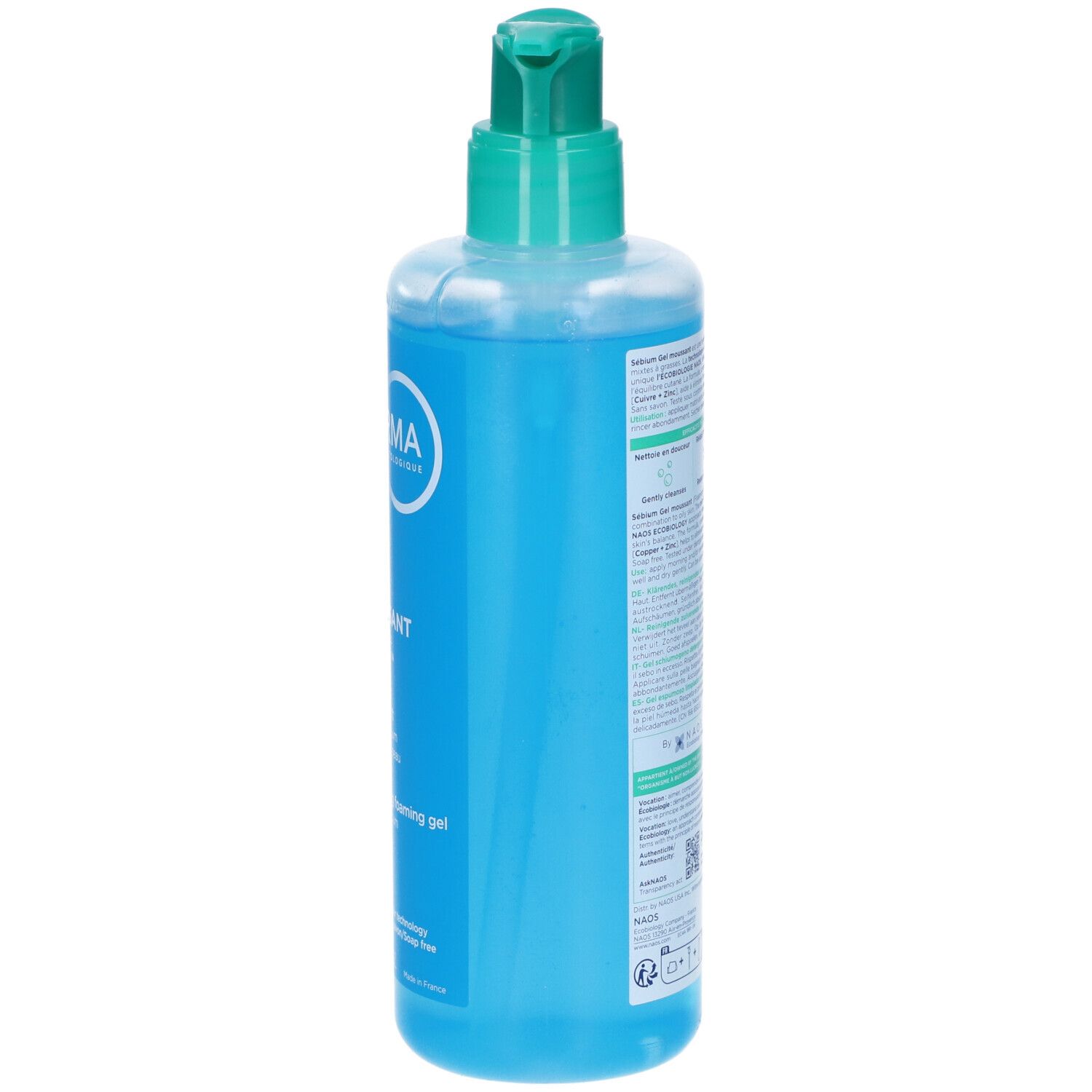 Blaue Flüssigkeit in einer durchsichtigen Pumpflasche mit grünem Verschluss.