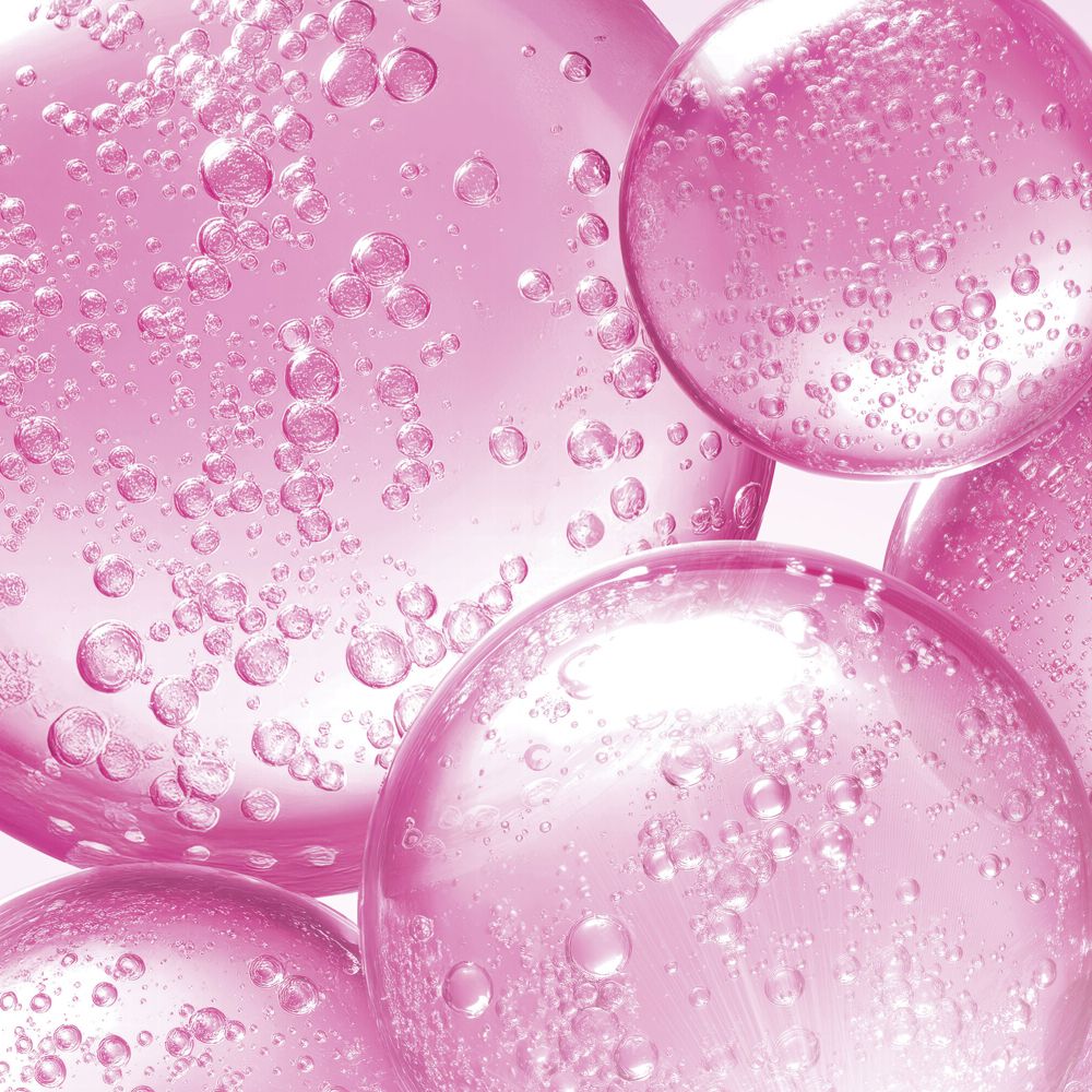 Primo piano di sfere rosa con molte piccole bolle d'aria al loro interno.