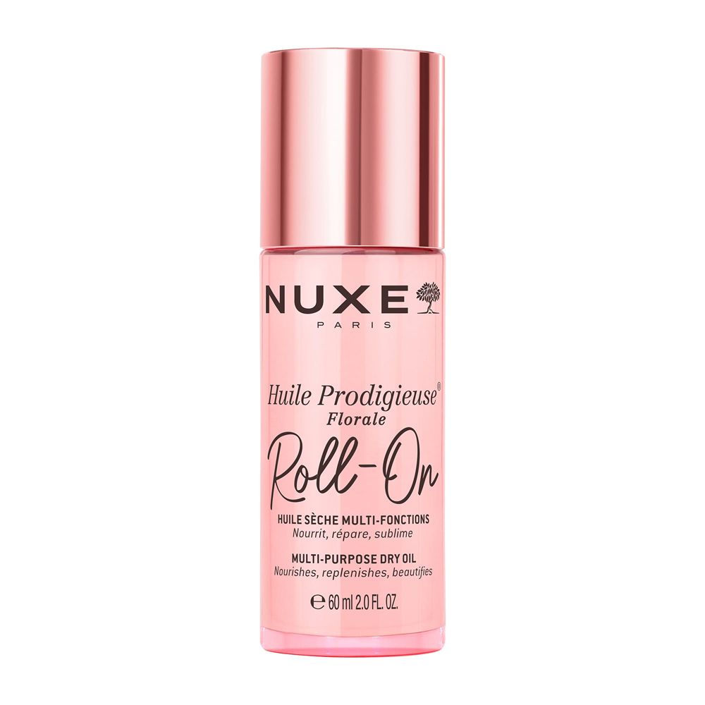 Nuxe Huile Prodigieuse Florale Roll-On. Flacone rosa, tappo argento. Scritta: Nuxe Paris, Roll-On.