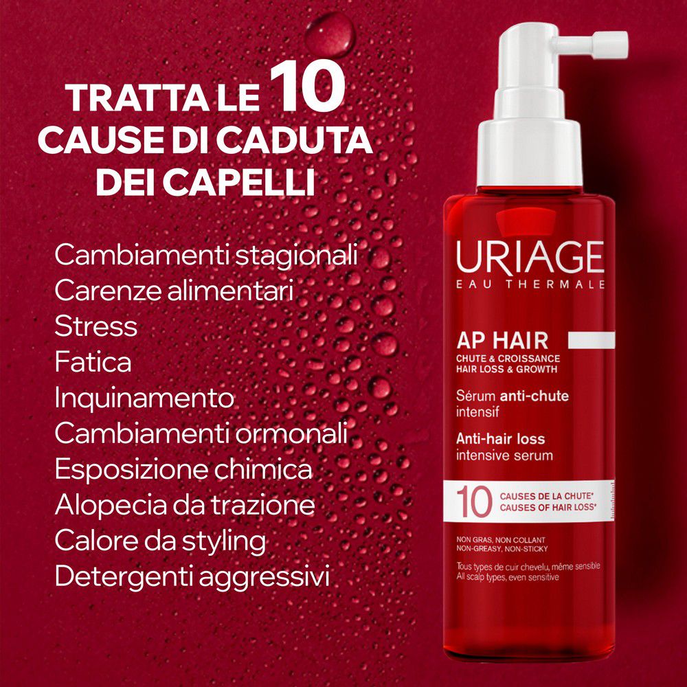 Rote Flasche mit weißem Applikator, Uriage AP Hair Anti-Haarausfall Serum.