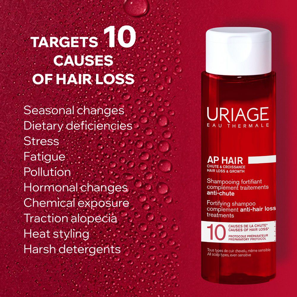 Uriage AP Hair Shampoo Flasche, rot, mit weißem Deckel. Zielt auf 10 Ursachen von Haarausfall ab.