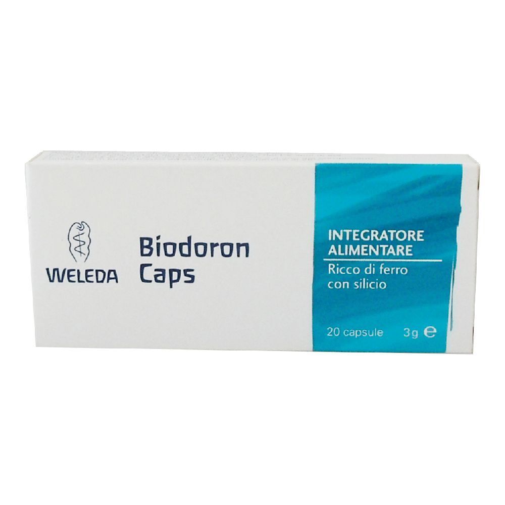 Scatola bianca con angolo blu. Scritto: Biodoron Caps, logo Weleda. Contiene 20 capsule. Testo: Integratore Alimentare, Ricco di ferro con silicio.