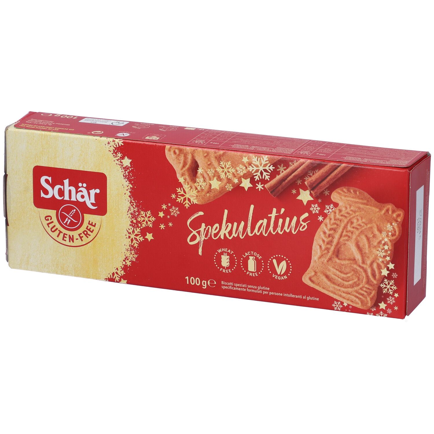 Scatola rossa di Spekulatius senza glutine. Scritte "Schär", "Spekulatius", "senza glutine" e loghi. Bastoncini di cannella e biscotti.