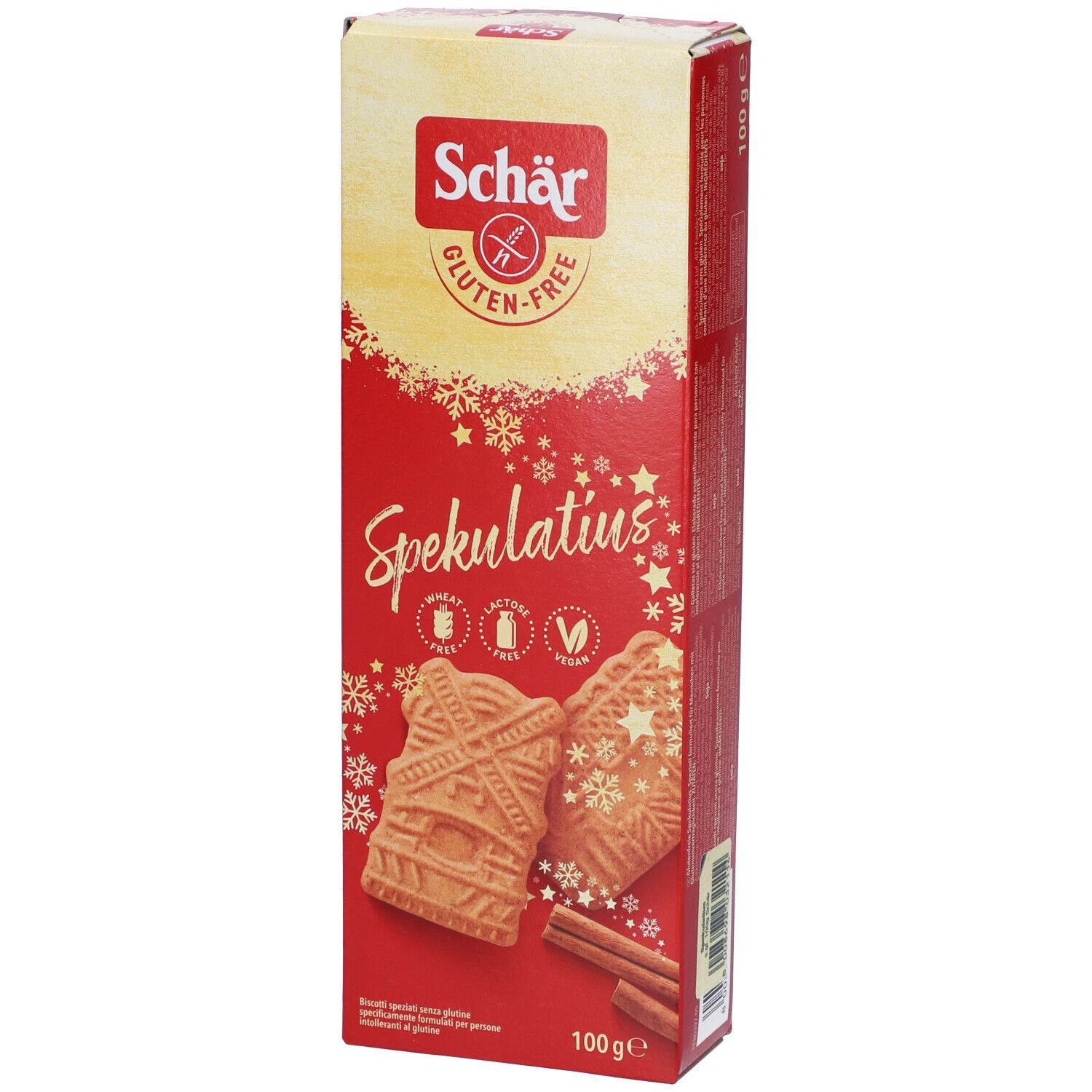 Scatola di Spekulatius senza glutine. Scritte "Schär", "Spekulatius", "senza glutine" e loghi. Bastoncini di cannella e biscotti.