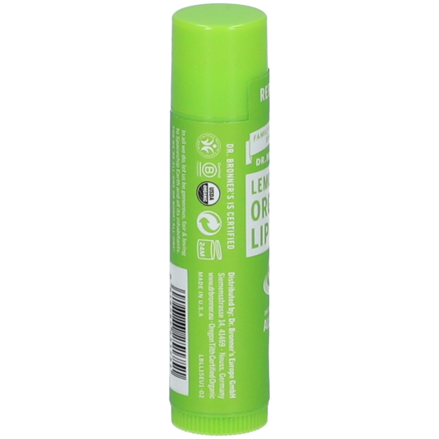 Retro dello stick di balsamo per labbra verde. Testo e codice a barre. Certificazioni e informazioni di contatto. Prodotto negli Stati Uniti.