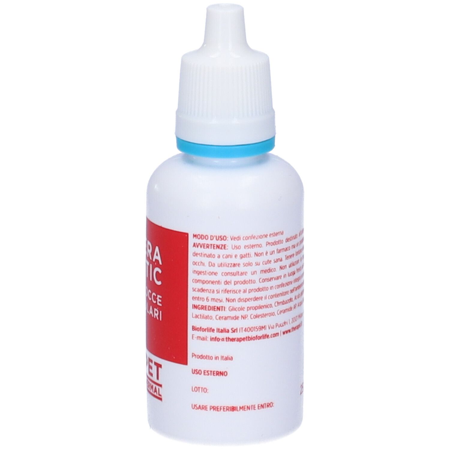 Flacone bianco con etichetta rossa. Scritta: THERAMICOTIC Gocce Auricolari. Testo con istruzioni e ingredienti.
