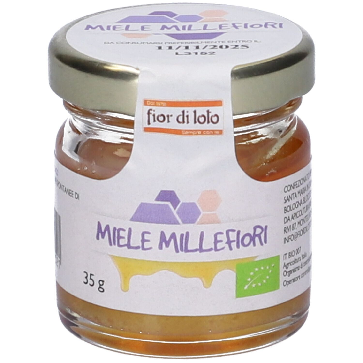 Vasetto di miele. Etichetta con 'fior di loto' e 'Miele Millefiori'. Scadenza 11/11/2025. 35g.
