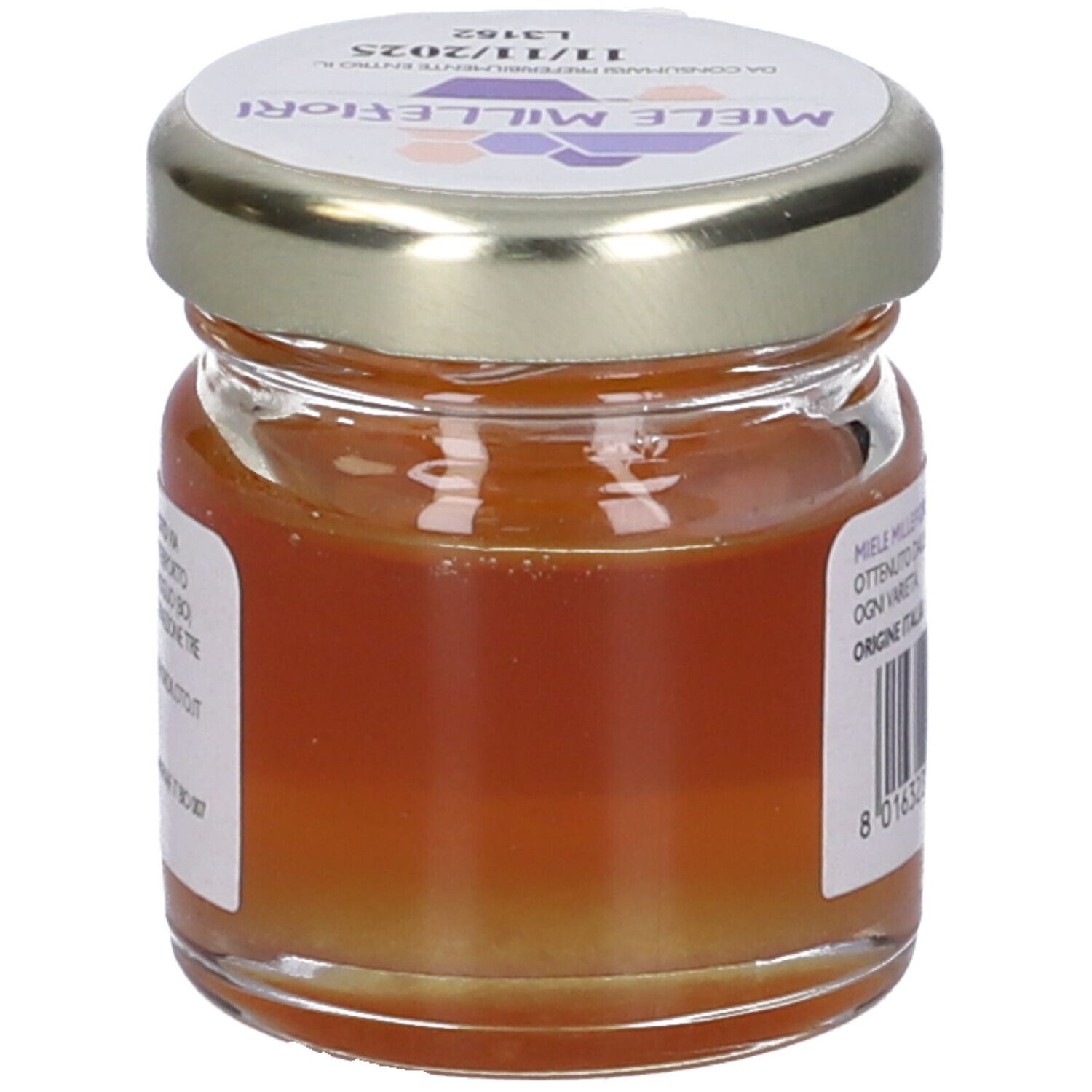 Vasetto di miele. Etichetta con 'Miele Millefiori'. Scadenza 11/11/2025. 35g.