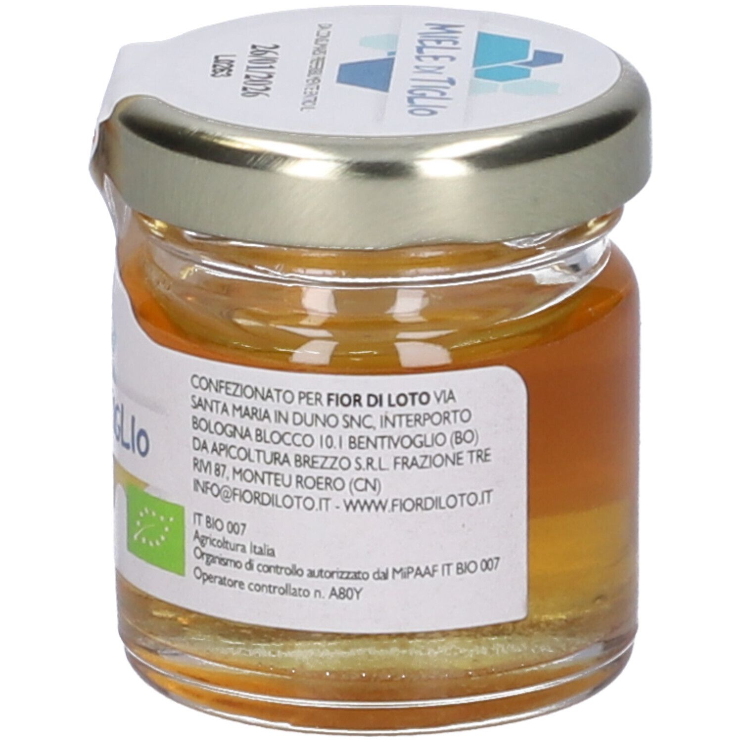 Vasetto di miele. Vista posteriore. Etichetta "Miele di Tiglio". Sigillo biologico. 35g. Informazioni produttore.