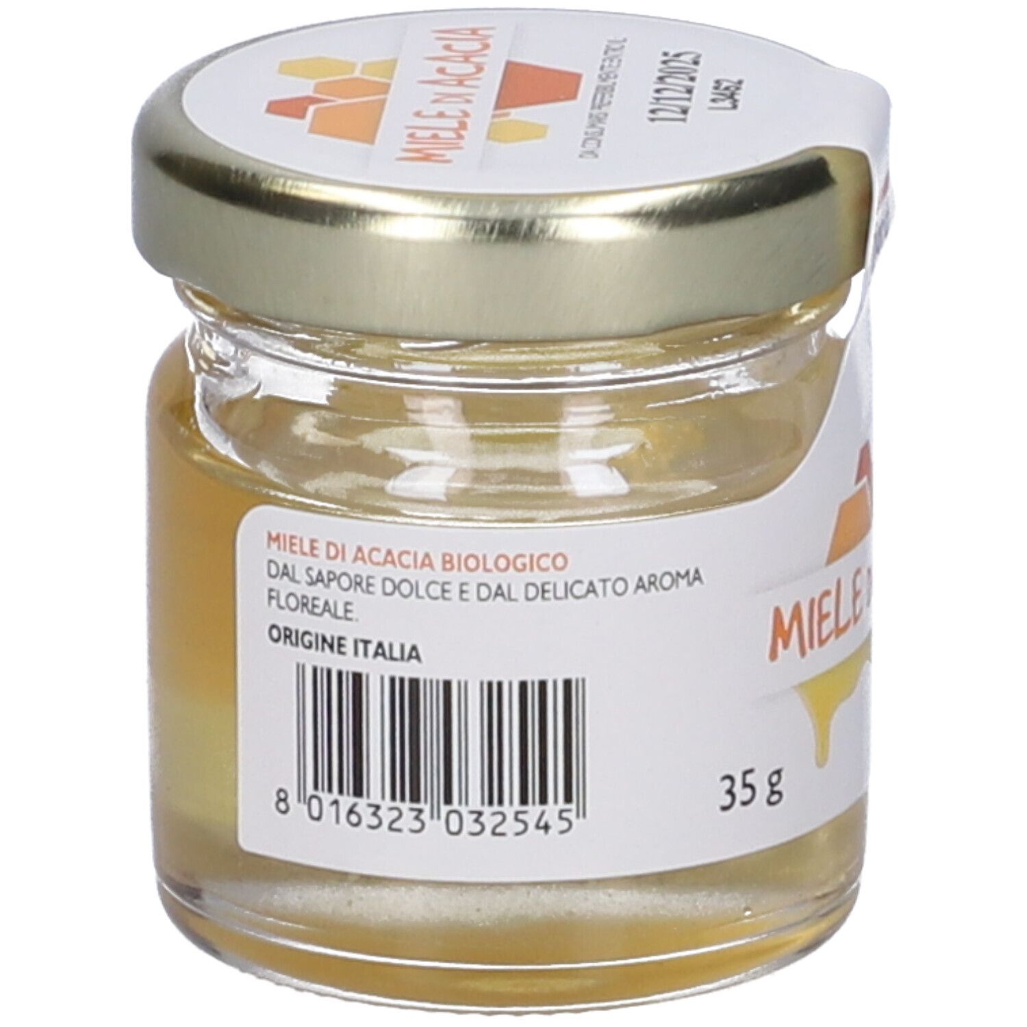 Vasetto di miele con etichetta 'Miele di Acacia'. Certificazione biologica. Data di scadenza sul coperchio. Scritta 'fior di loto'.