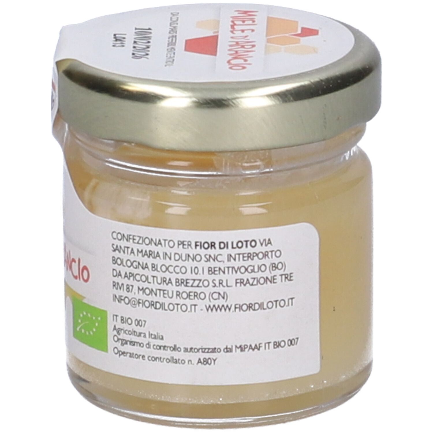 Vasetto di miele con coperchio dorato. Etichetta 'Miele d'Arancio'. Sigillo bio. Informazioni.