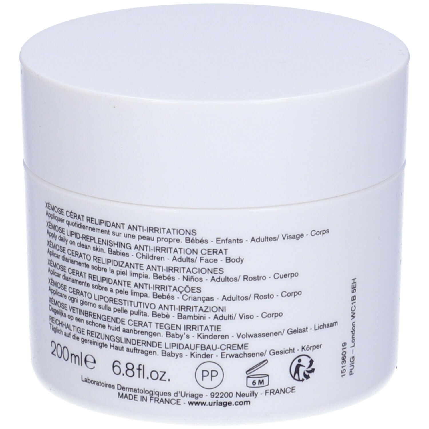 Retro del vaso bianco. Testo multilingue. Scritta: Xémose Cérat relipidant anti-irritations.
