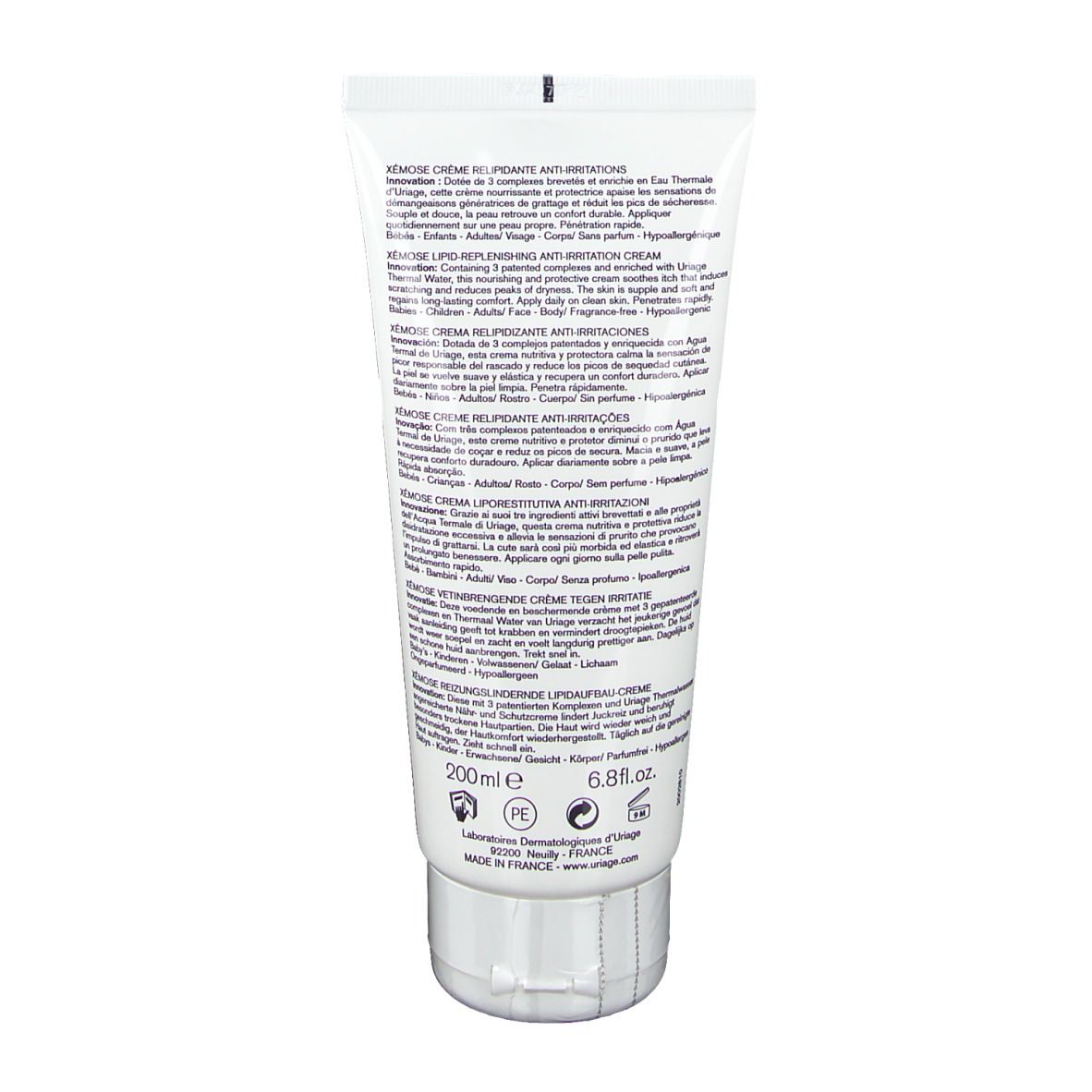 Dos d'un tube blanc. Texte multilingue. Informations sur le produit.