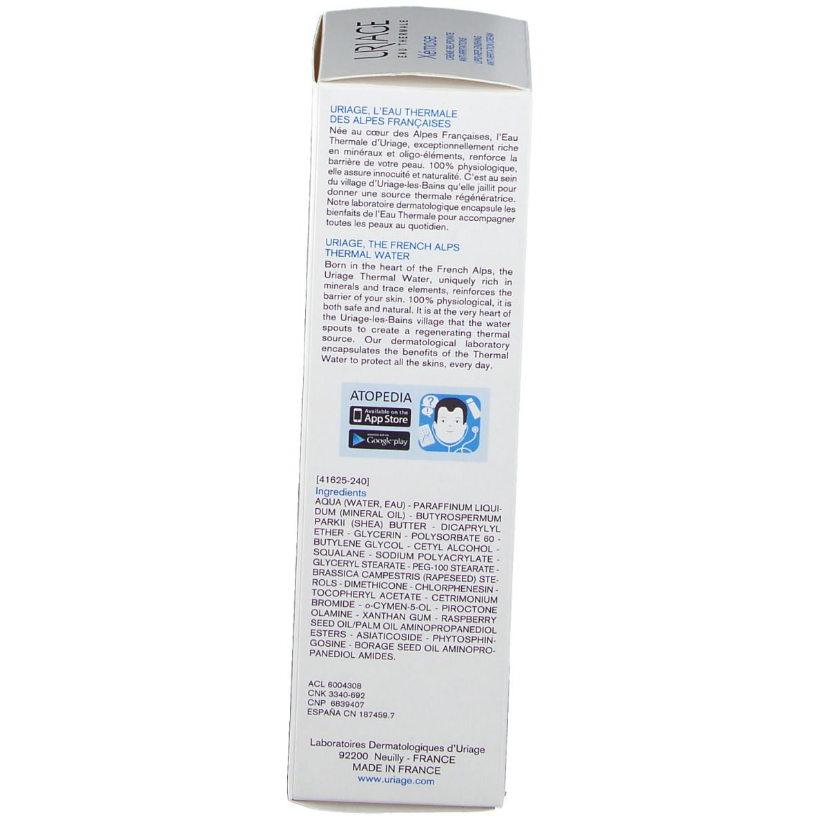 Côté de l'emballage du produit. Texte multilingue. Ingrédients et fabricant.