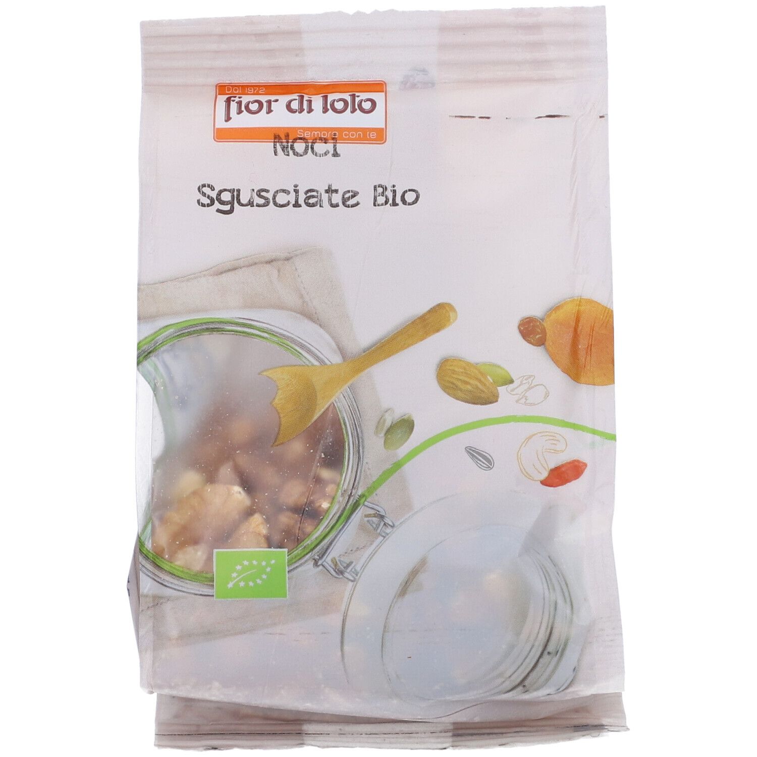 Confezione di noci. Scritta: Noci Sgusciate Bio. Logo: Fior di Loto. Certificazione bio.