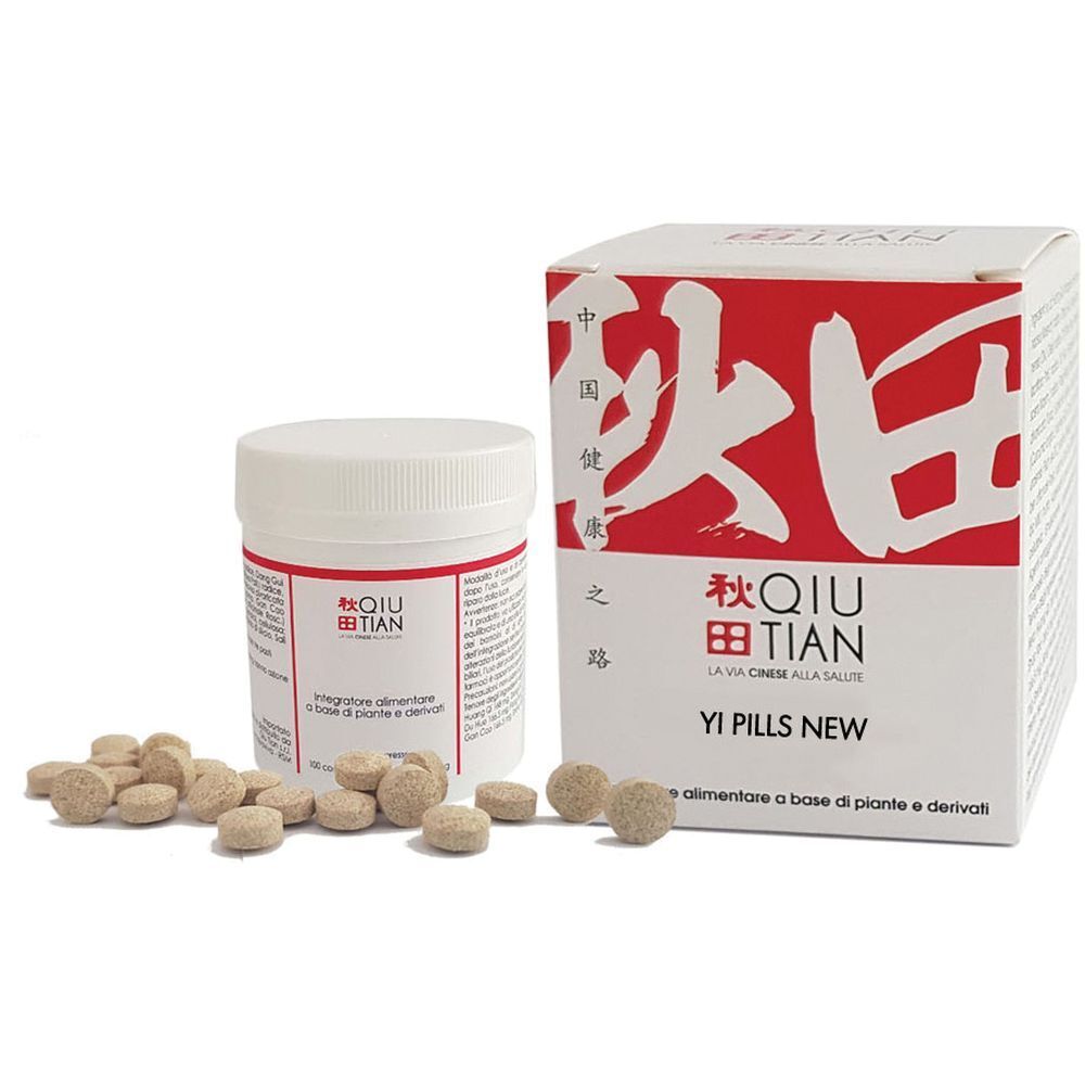 Flacone e scatola bianchi con scritte rosse. Scritto: QIU TIAN, Yi Pills New. Compresse sparse.