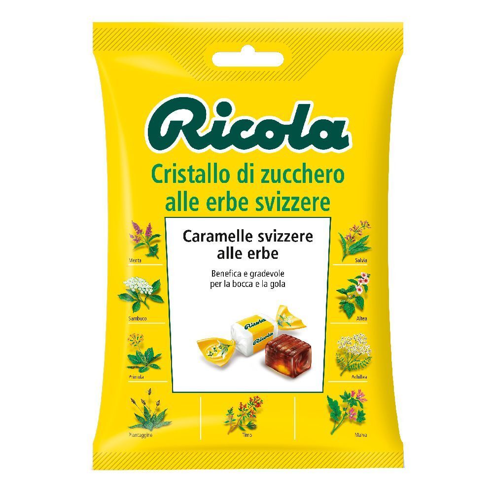 Confezione gialla Ricola. Testo: Cristallo di zucchero alle erbe svizzere. Mostra caramelle svizzere alle erbe.