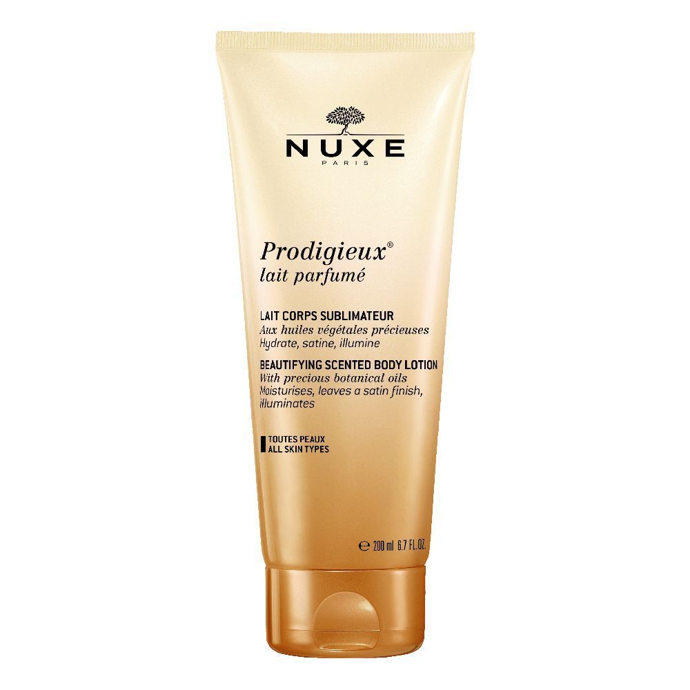 Tubo beige con logo e nome del marchio. Testo: Prodigieux lait parfumé, 200 ml.