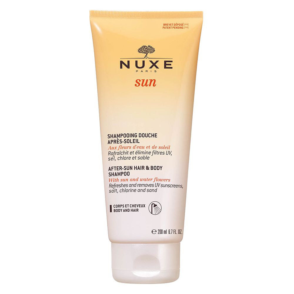 Tubo giallo-bianco con logo "NUXE sun". Testo: "Shampooing Douche Après-Soleil". Contiene 200 ml.