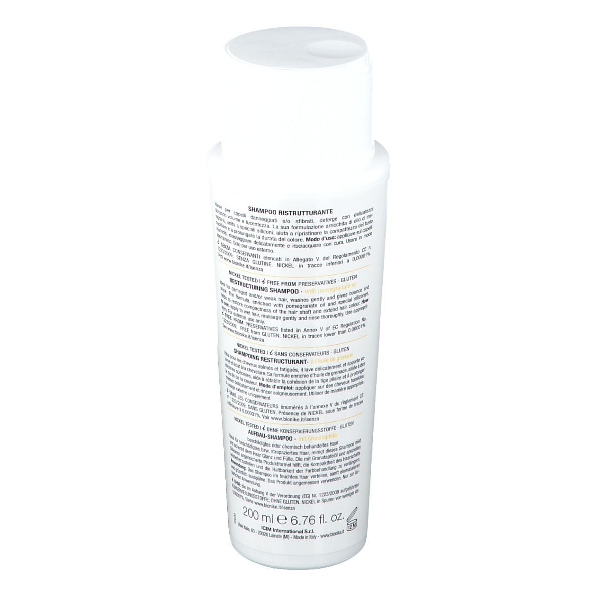 Flacon blanc. Inscription: Shine On Nutri-hair Shampoo. Marque: BioNike. Nickel Tested, sans conservateurs.