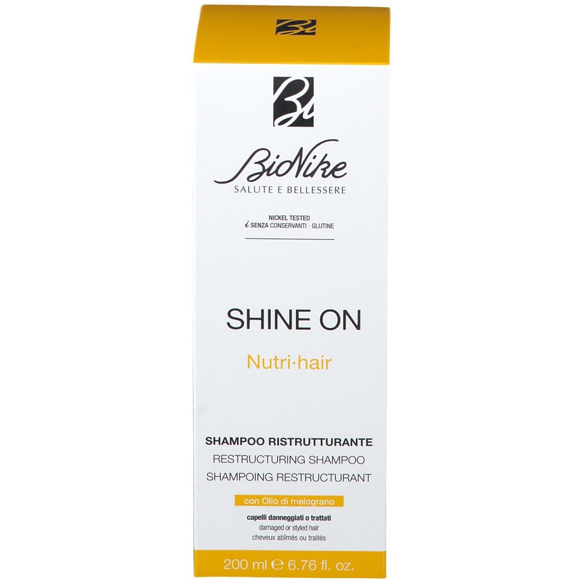 Emballage du produit. Carton. Inscription: Shine On Nutri-hair Shampoo. Marque: BioNike. 200 ml.