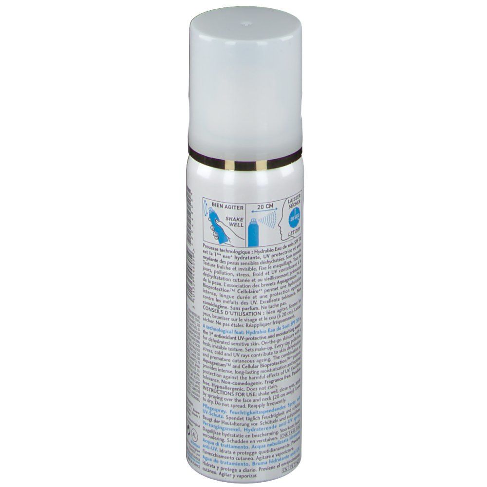 Flacone spray bianco. Retro con testo e illustrazioni. Anello dorato. Tappo bianco.