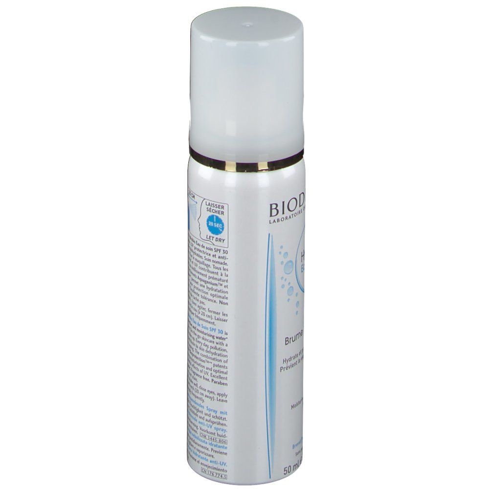 Flacone spray bianco. Lato con testo e illustrazioni. Anello dorato. Tappo bianco.