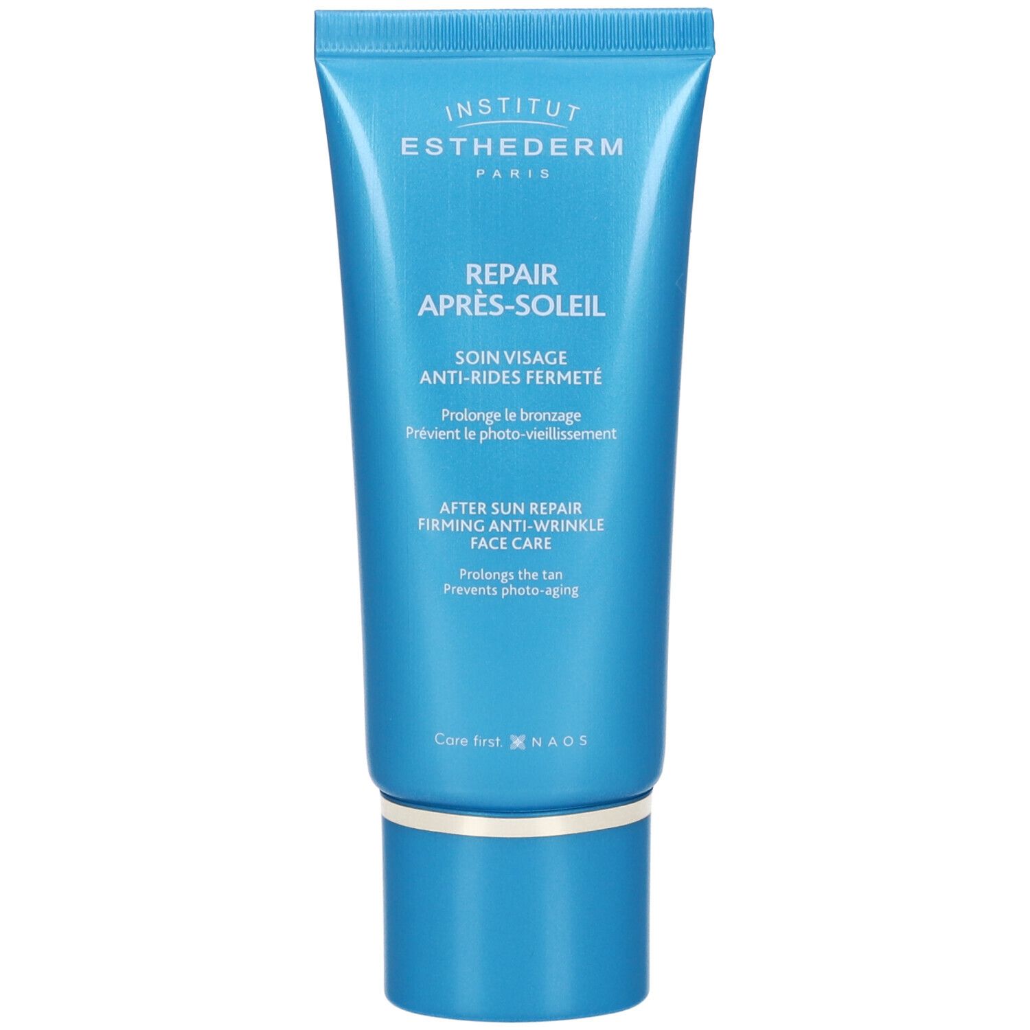 Tubo blu con tappo bianco. Scritta: Institut Esthederm, Repair Après-Soleil, Soin Visage Anti-Rides Fermeté.
