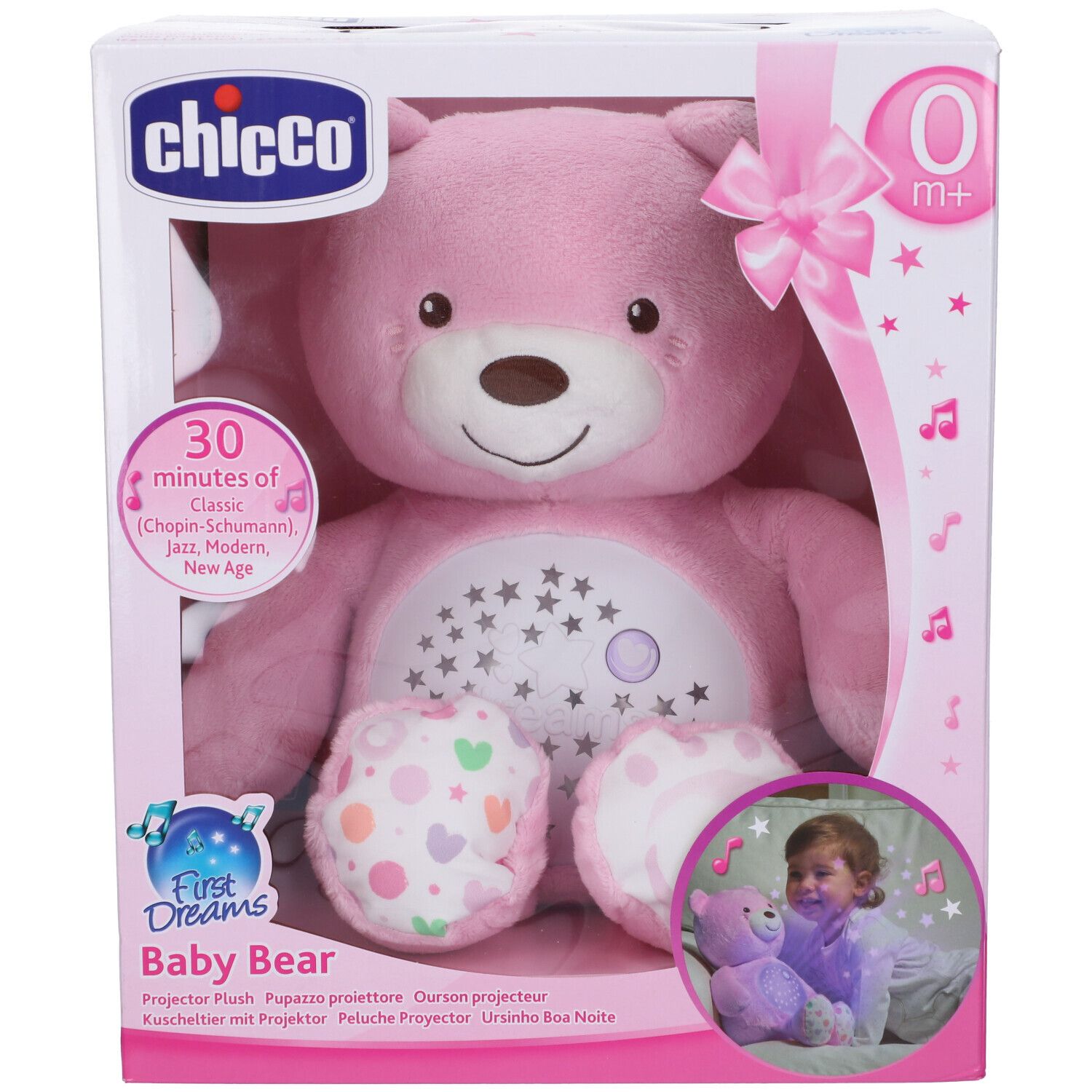Chicco Baby Orsetto Rosa in confezione. Orsetto rosa con proiettore stelle, fiocco e etichetta 0+. Finestra visibile.