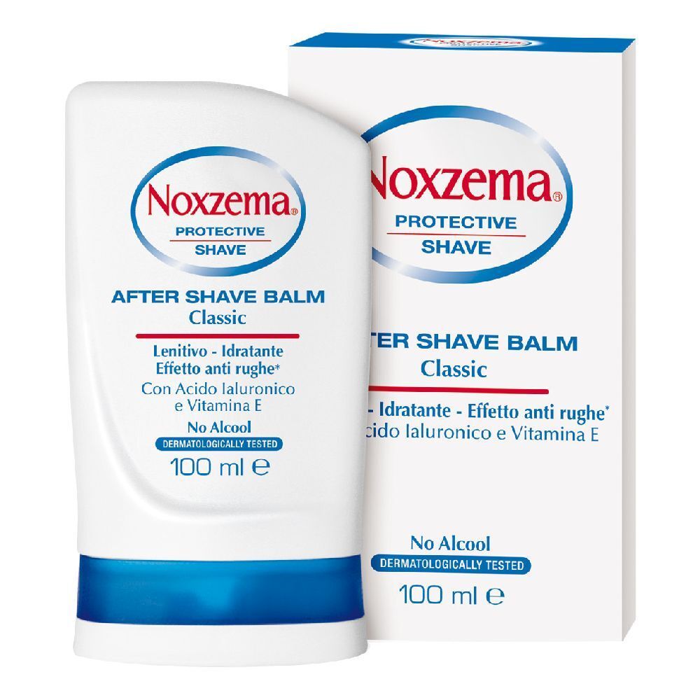 Flacone e scatola bianchi. Scritta: Noxzema After Shave Balm Classic. Dettagli blu. Dermatologicamente testato.