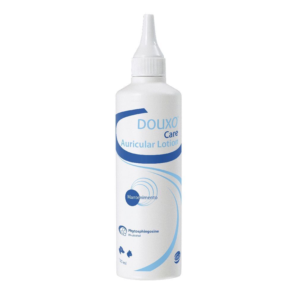 Flacone bianco con etichetta blu. Scritta DOUXO Care Auricular Lotion. Con beccuccio applicatore.