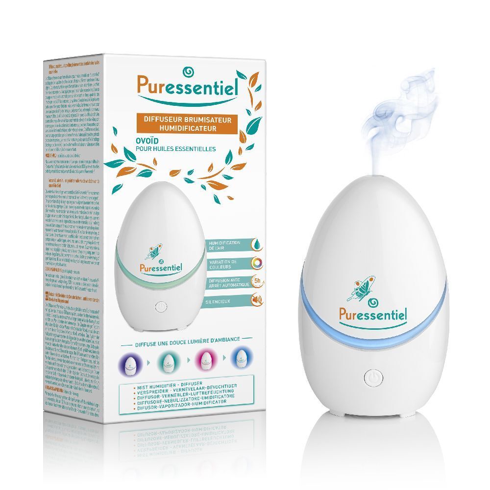 Diffusore bianco a forma di uovo con luce blu. Sulla confezione è scritto "Puressentiel". Il diffusore produce vapore.